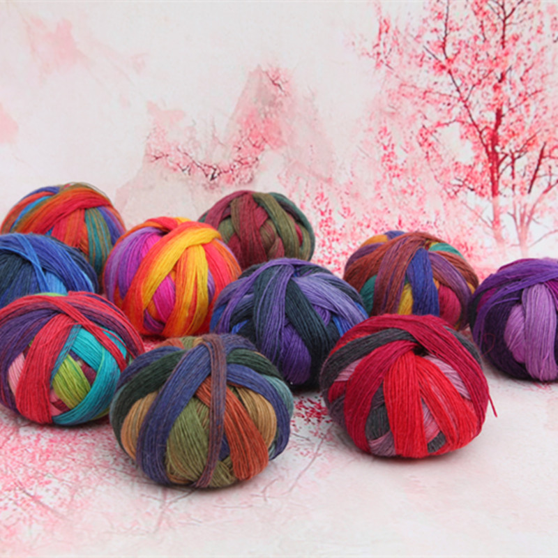 毛线批发 一件代发羊毛彩虹段染贵妇人披肩毛线580米段染