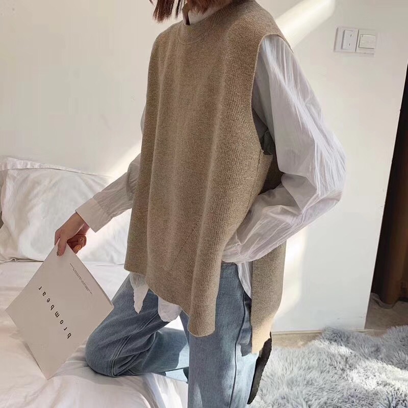 2023 Otoño e Invierno transfronterizo Chaleco de punto de mujer estilo coreano cuello redondo suéter suelto suéter sin mangas entrega de una pieza