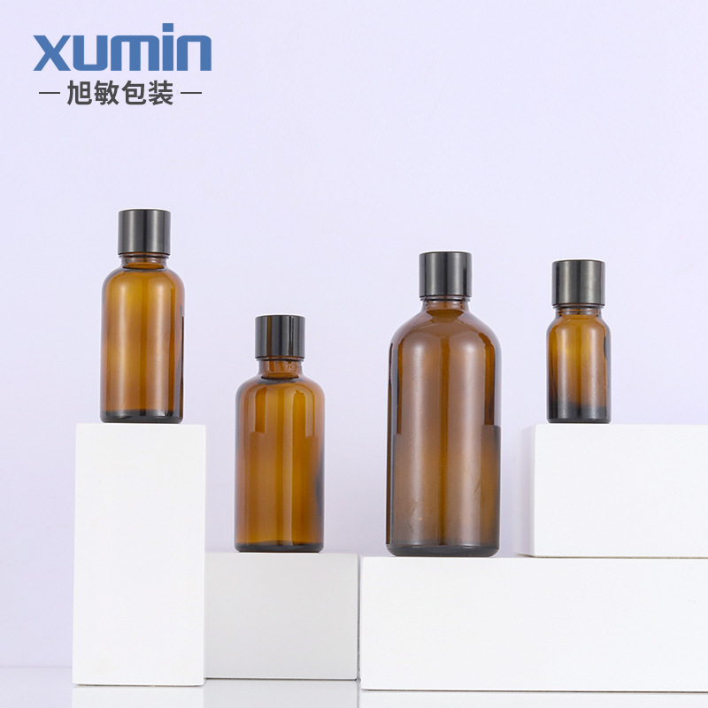 Fábrica en stock botella de aceite esencial de vidrio marrón conveniente sub-botella cuentagotas cosmética Xumin material de embalaje