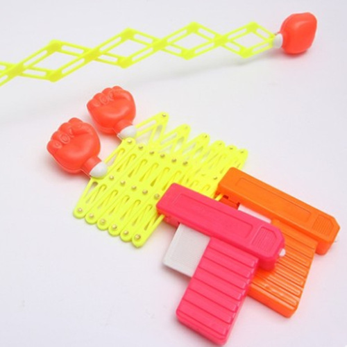 Children's funny magic elastic telescopic fist gun children's toy telescopic spring toy gun wholesale