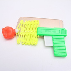 Children's funny magic elastic telescopic fist gun children's toy telescopic spring toy gun wholesale