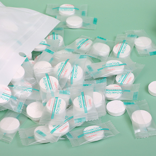 Factory direct sales compressed facial mask 100 bags of DIY disposable candy mask paper non-woven absorbent mask grains