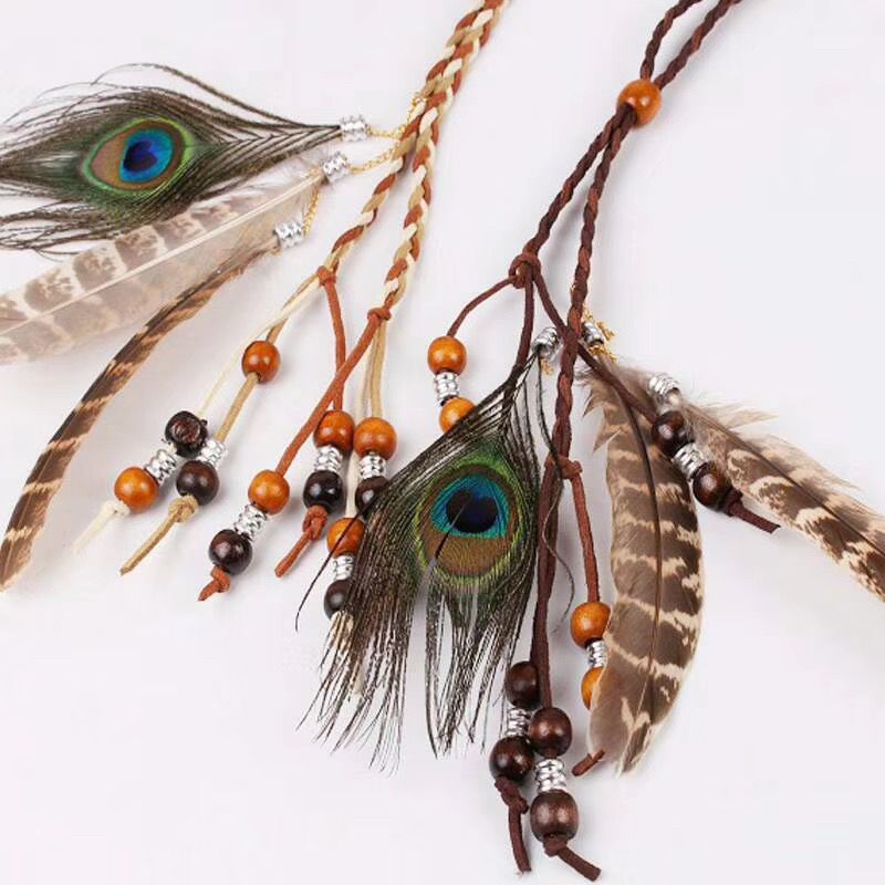 Venta directa de fábrica de tocados de plumas de pavo real para zonas turísticas, diademas de plumas, diademas étnicas bohemias indias con borlas