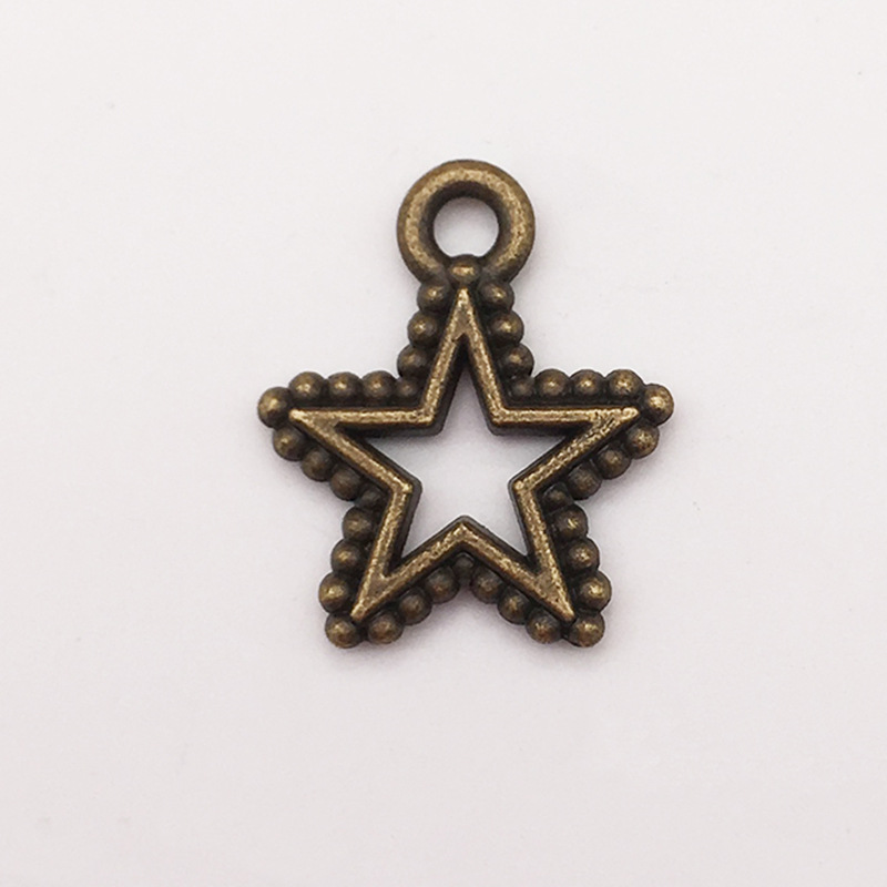 Accesorios de la joyeria DIY Hollow Star Luna sol meteoro aleacion joyeria colgante pendientes pulsera colgante