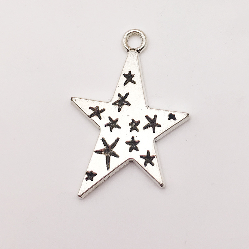 Accesorios de la joyeria DIY Hollow Star Luna sol meteoro aleacion joyeria colgante pendientes pulsera colgante