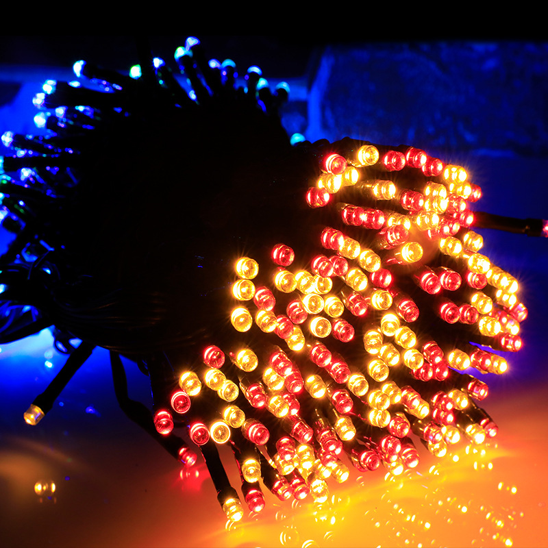 Julebelysning lavspent mørkegrønn linje full av stjerner små fargede lys hage utendørs dekorasjon Jul LED lysstreng_voghion.com