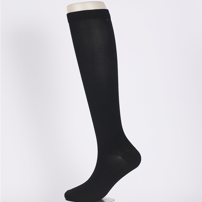 Calcetines de compresión de pareja de color sólido de las mujeres calcetines de compresión de pareja de otoño e invierno apretados sobre la rodilla calcetines de becerro