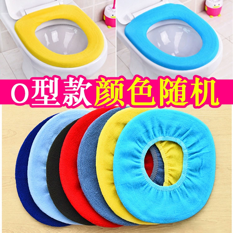 Handheld universal toilet seat