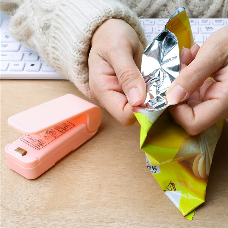 Portable mini -sealing machine snack plastic bag sealing machine household hand -pressed thermal sealing machine small sealing machine wholesale