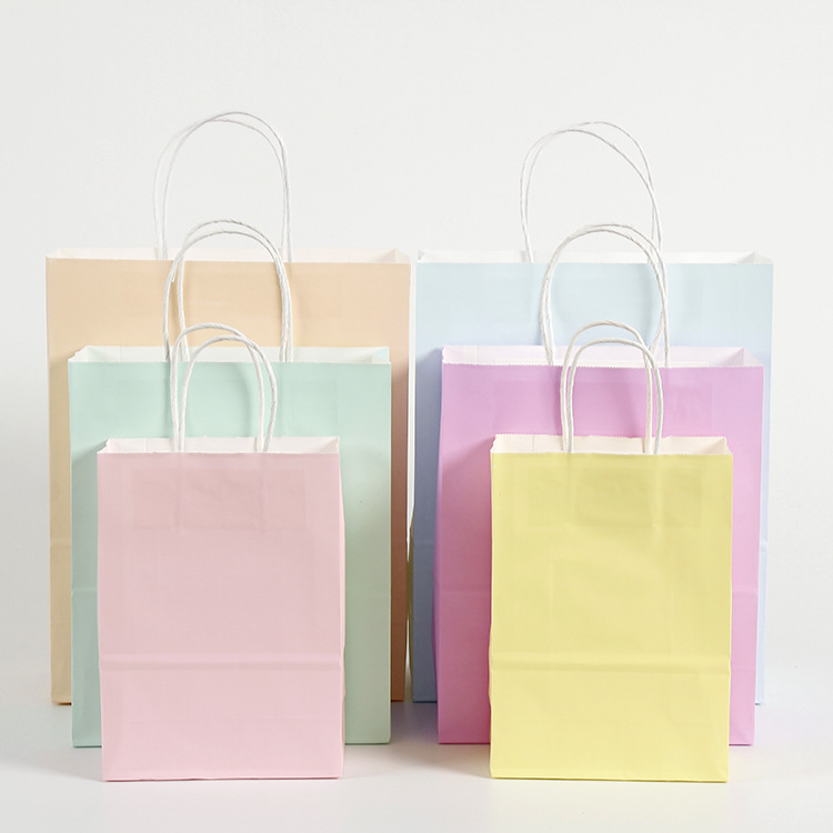 Publicidad bolsa de papel Kraft en stock bolso para llevar leche té bolso de compras logotipo impreso Universal color caramelo