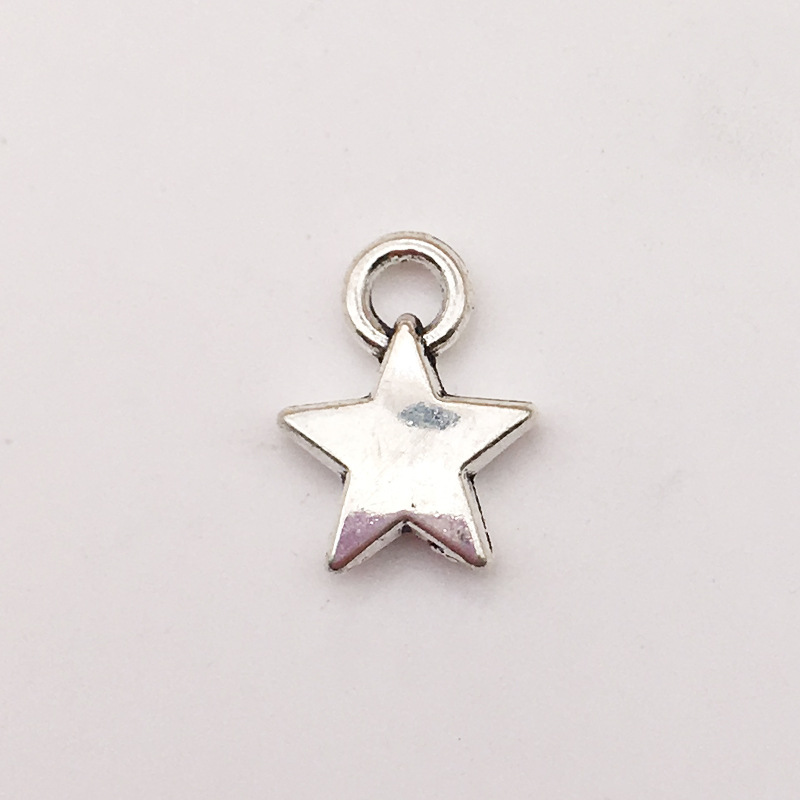Accesorios de la joyeria DIY Hollow Star Luna sol meteoro aleacion joyeria colgante pendientes pulsera colgante