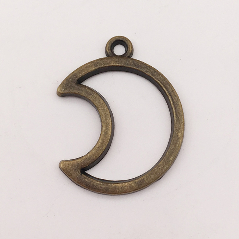 Accesorios de la joyeria DIY Hollow Star Luna sol meteoro aleacion joyeria colgante pendientes pulsera colgante