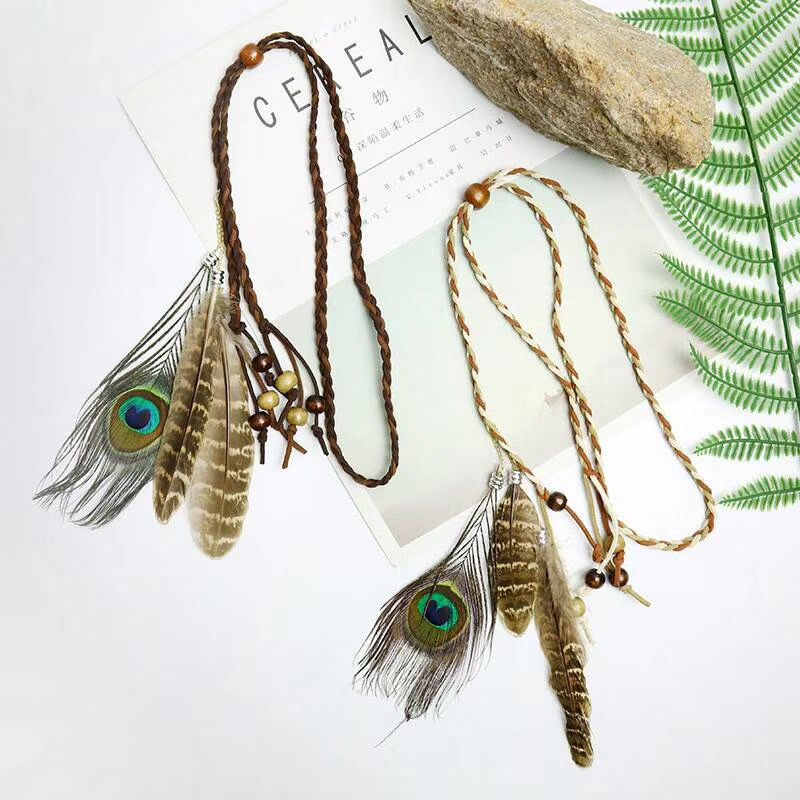 Venta directa de fábrica de tocados de plumas de pavo real para zonas turísticas, diademas de plumas, diademas étnicas bohemias indias con borlas