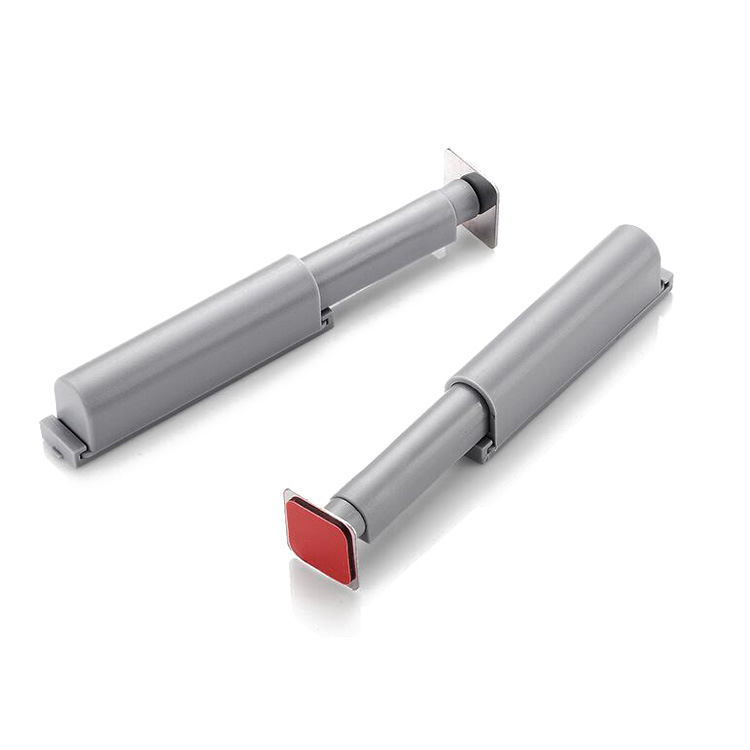 La manija táctil-libre magnética del rebote de la bisagra del gabinete del dispositivo del rebote de la puerta de gabinete presiona la puerta de gabinete y abre el dispositivo autoelástico magnético