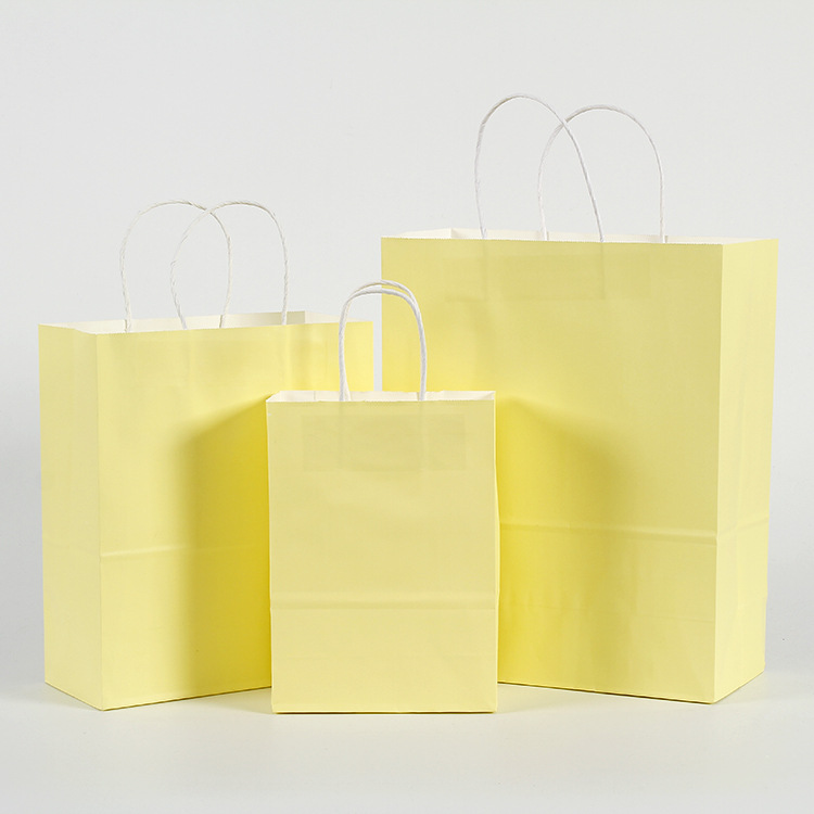 Publicidad bolsa de papel Kraft en stock bolso para llevar leche té bolso de compras logotipo impreso Universal color caramelo
