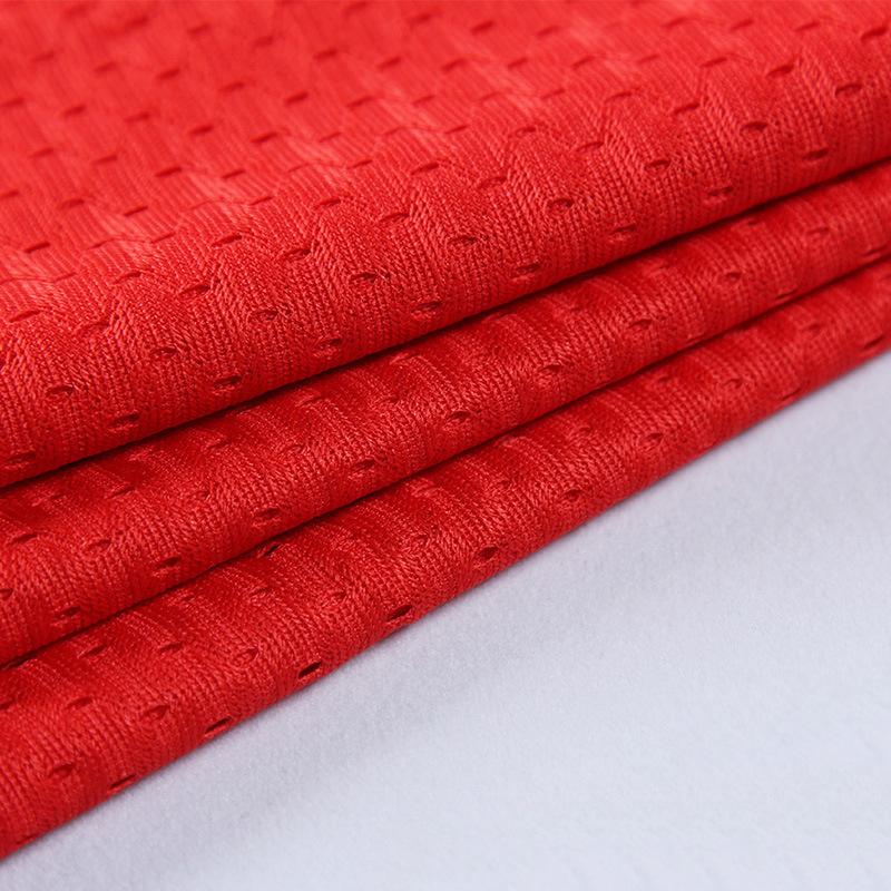 全涤低弹网布针织面料运动服里布内衬面料橘色网眼布全涤网布