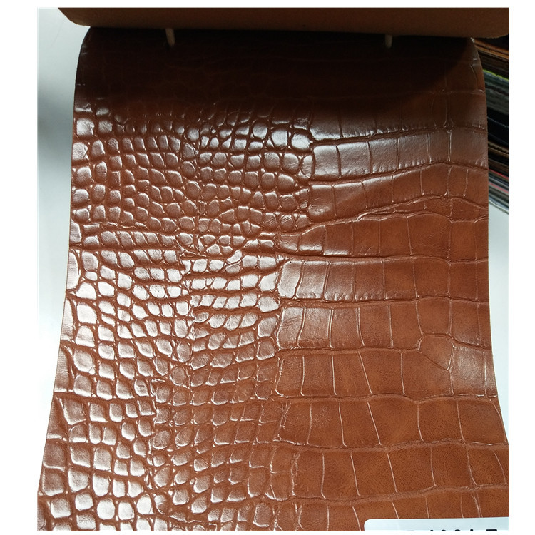 厂家生产人造革现货供应PU皮料鳄鱼纹鞋面料手袋皮具料商标家具革