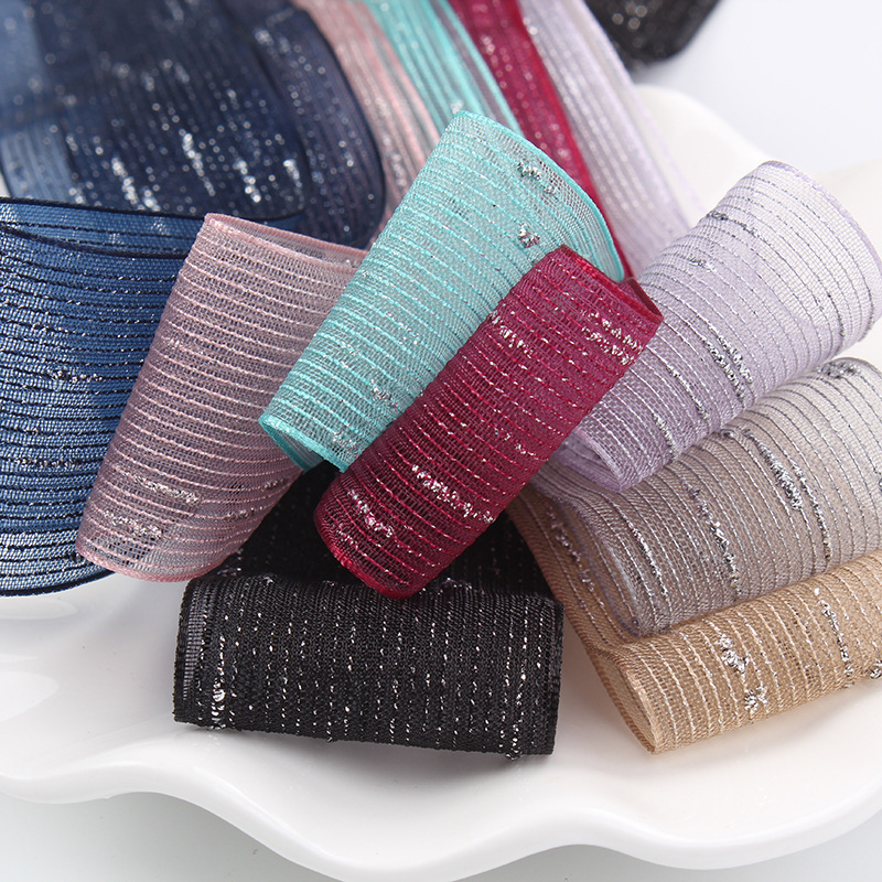 Factory spot wholesale Korean gold and silver silk jump point snow yarn flower packaging materials hot selling bow webbing