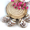 European and American beach wind earrings Leopard -head conch jewelry shell -shell ears gold conch jewelry