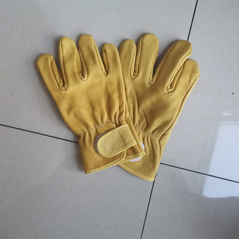 Guantes cortos de cuero protectores al por mayor para conductores, hechos de cuero vacuno integral, resistentes al desgaste, para soldadores, suministros de protección laboral, fabricante, engrosados. image 4