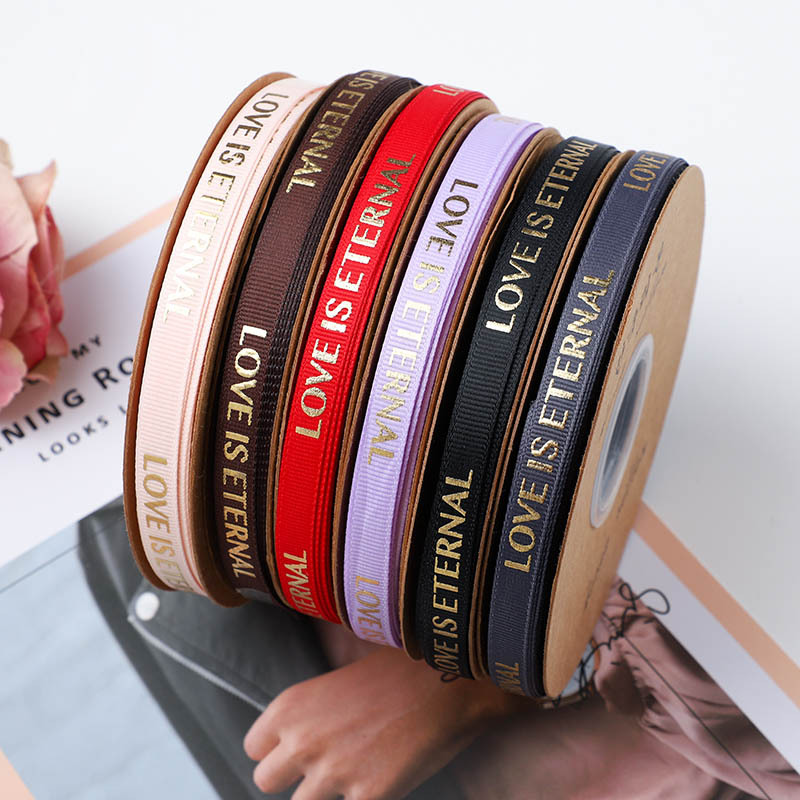 Al por mayor cinta de rosca de 1cm cinta coreana cinta de seda embalaje de flores caja de regalo decoración cinta inglesa acanalada 40 yardas