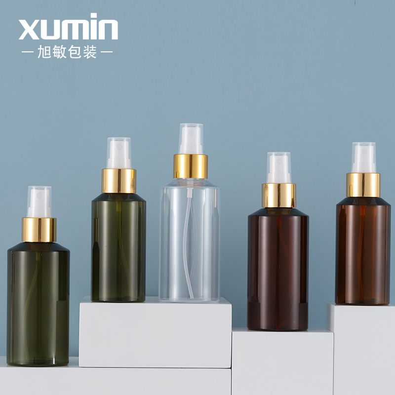 En stock botella de spray botella de embalaje cosmético aerosol blanco anillo de oro brillante hombro oblicuo PET puro botella de spray de rocío Xumin material de embalaje
