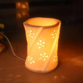 创意雕刻透光插电陶瓷香薰灯小夜灯工艺礼品蜡烛炉精油灯现代简约