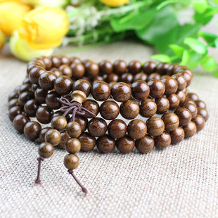 Factory wholesale gold sandalwood bracelet 108 beads bracelet gold-like nanmu men and women couple jewelry gift