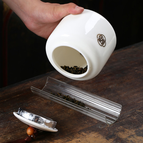 Large mutton-fat jade gold-painted tea jar, creative Chinese white porcelain tea jar, sealed jar, storage jar