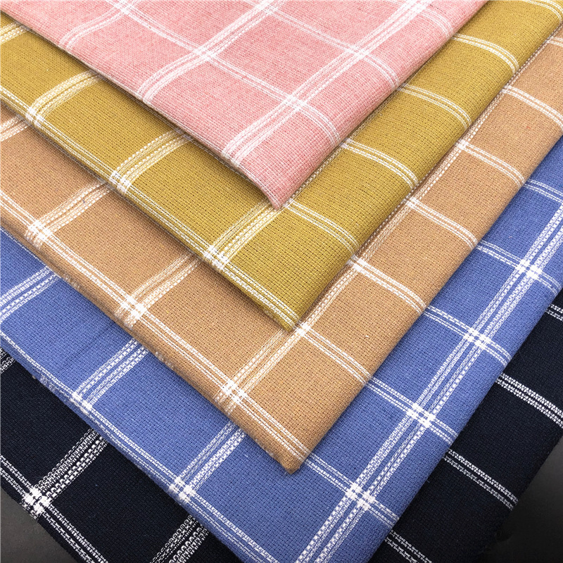 In stock supply thick roving polyester cotton yarn-dyed fabric plaid fabric imitation linen sofa bag fabric