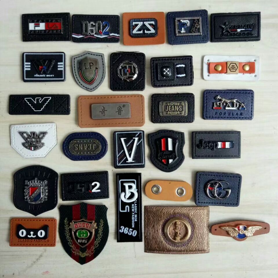 （工厂旗舰店）专业供应各种中高档牛皮 pu皮标 低价促销