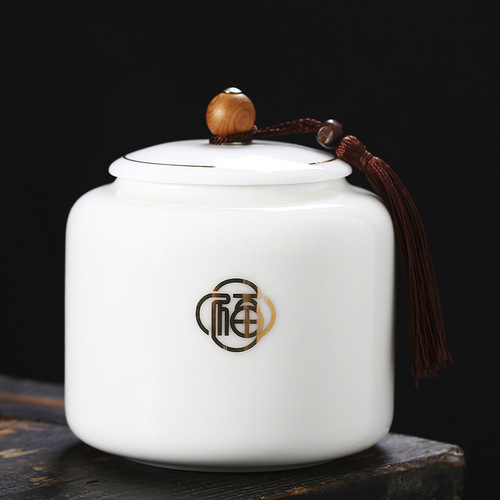 Large mutton-fat jade gold-painted tea jar, creative Chinese white porcelain tea jar, sealed jar, storage jar