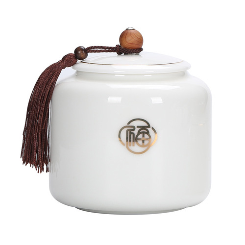 Large mutton-fat jade gold-painted tea jar, creative Chinese white porcelain tea jar, sealed jar, storage jar