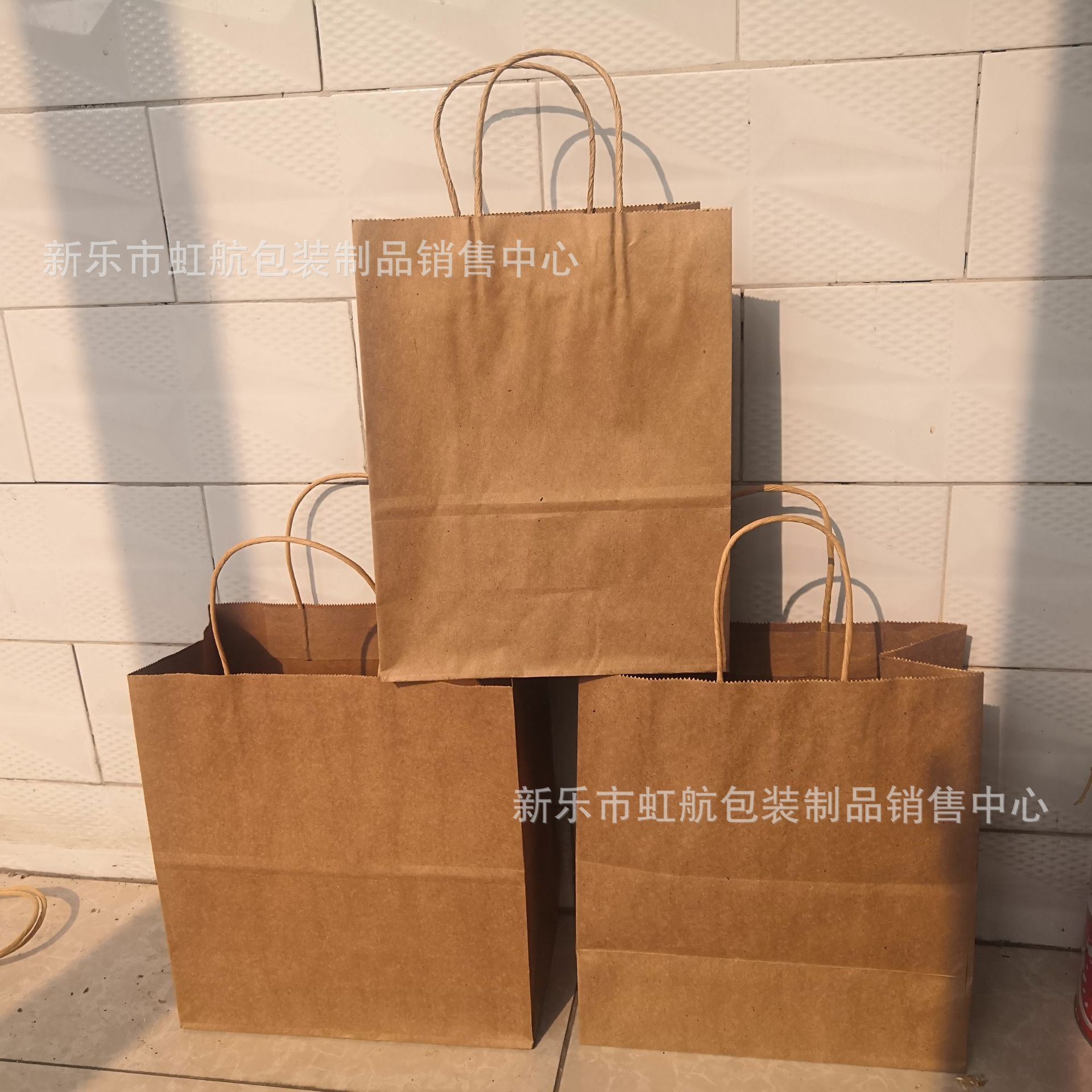 服装牛皮纸纸袋纸袋牛皮纸纸袋 手提袋服装购物纸袋可印LOGO