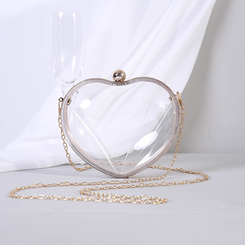 Borsa clutch trasparente a cuore in acrilico per donna_voghion.com
