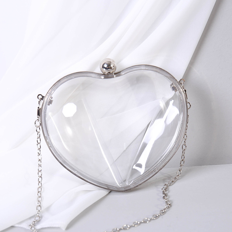 Borsa clutch trasparente a cuore in acrilico per donna_voghion.com