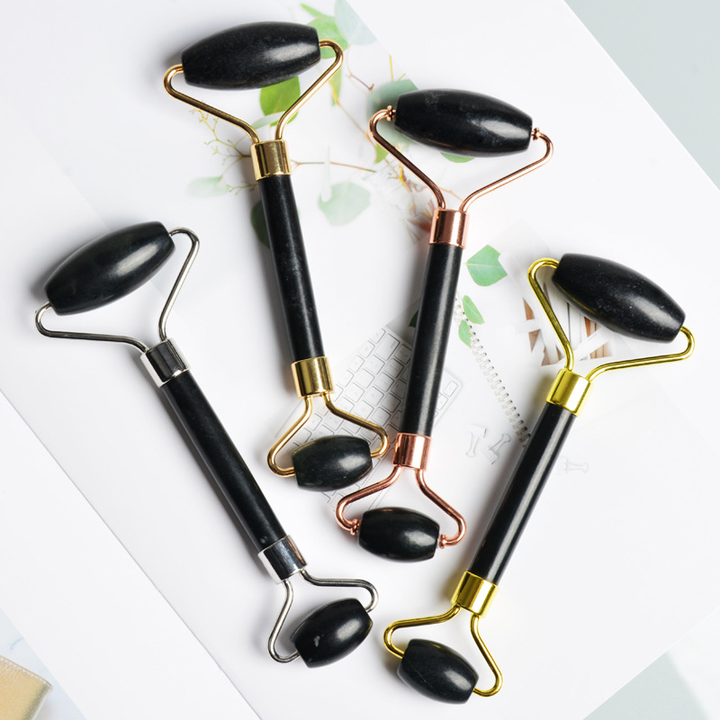 Cosmetic pulls up handheld double-sided massager for face