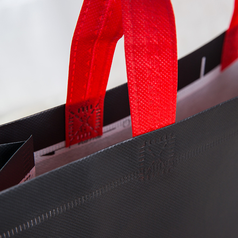 Película tridimensional bolsa portátil no tejida color protección del medio ambiente bolsa de compras portátil contraste color logo en stock bolso de las mujeres