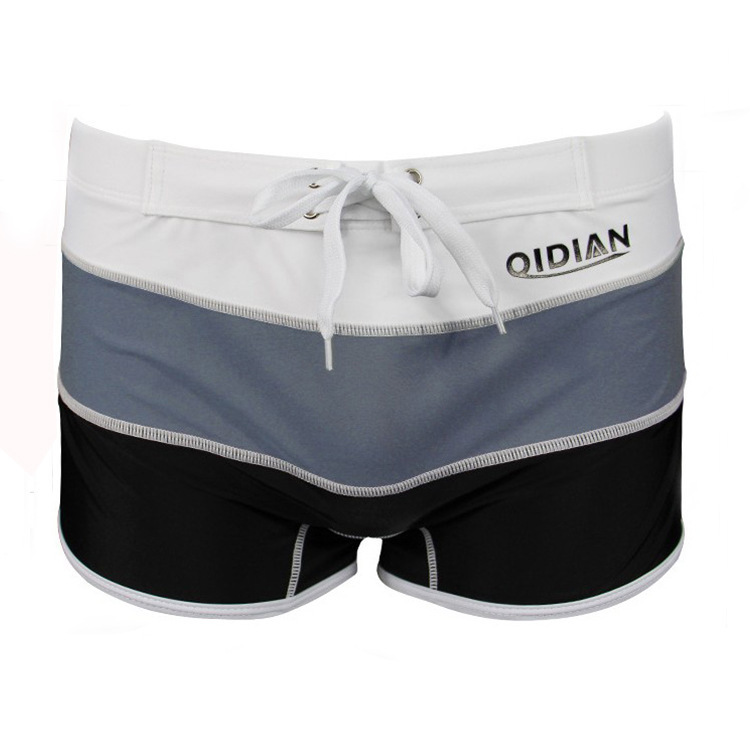 Europe and the United States new European and American men's swimming trunks boxer swimming trunks fashion low waist gradient swimsuit plus large size swimming trunks