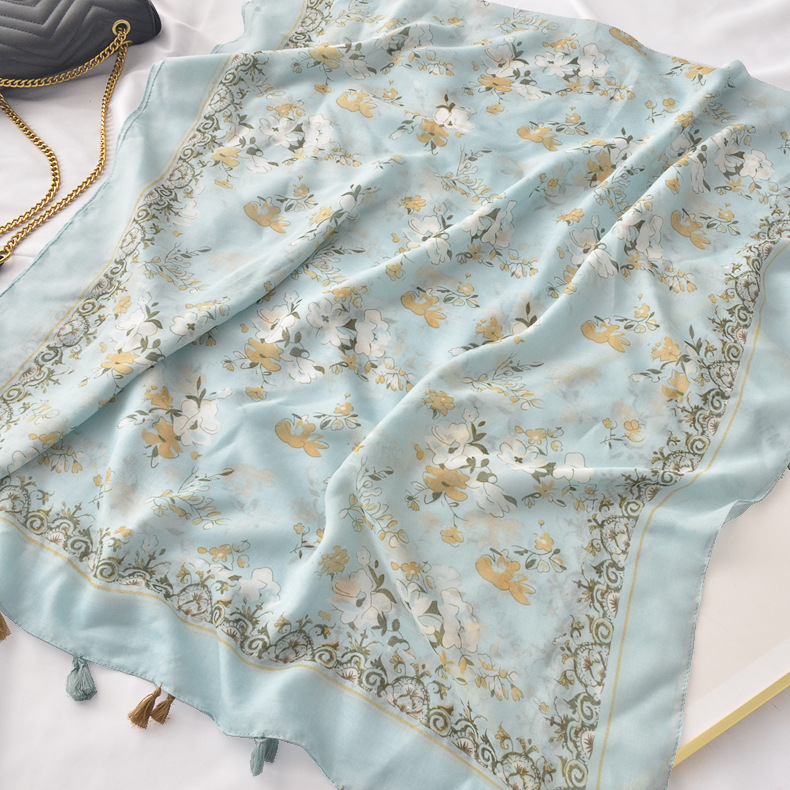 Primavera y verano borla fina bufanda decorativa protector solar chal nuevo artístico fresco azul claro impreso bufanda playa toalla