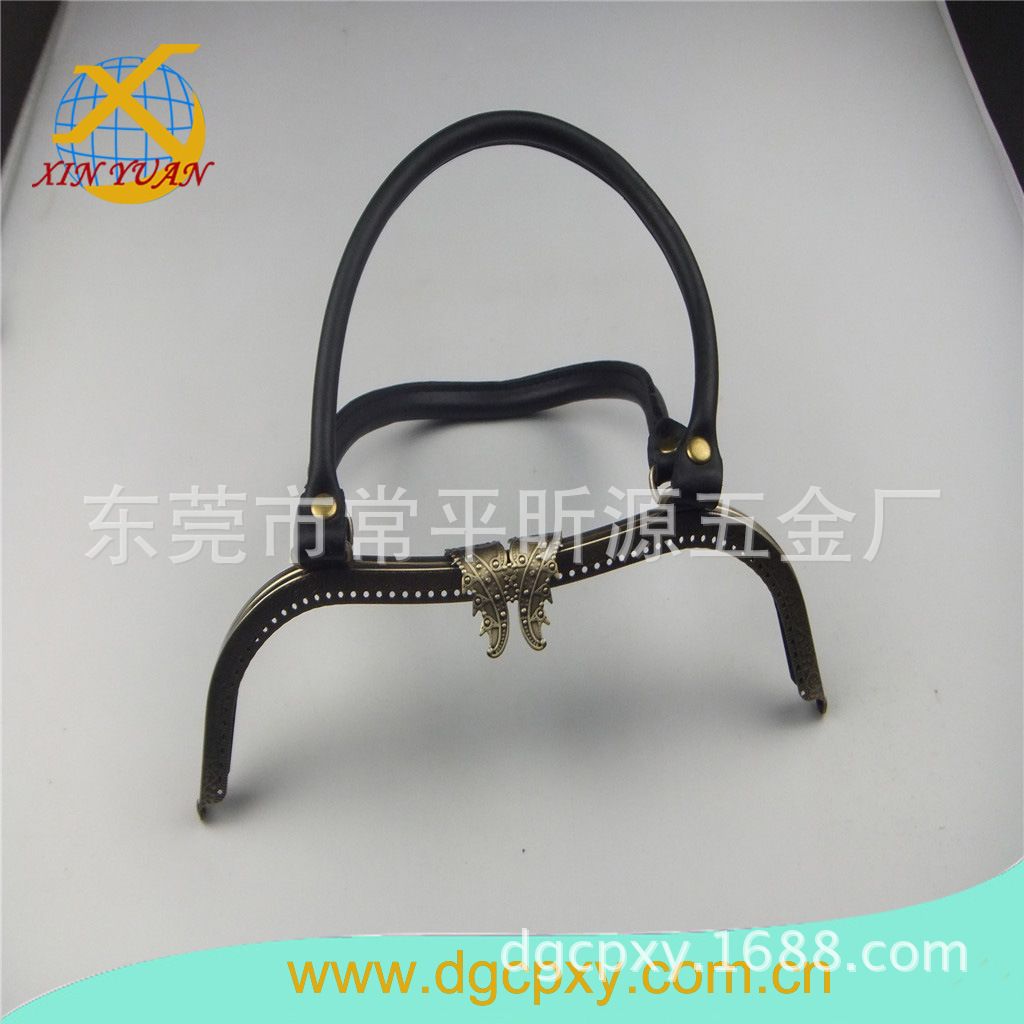 厂家生产复古压纹针孔凹腰蝴蝶头手袋铰 ，手提包五金架
