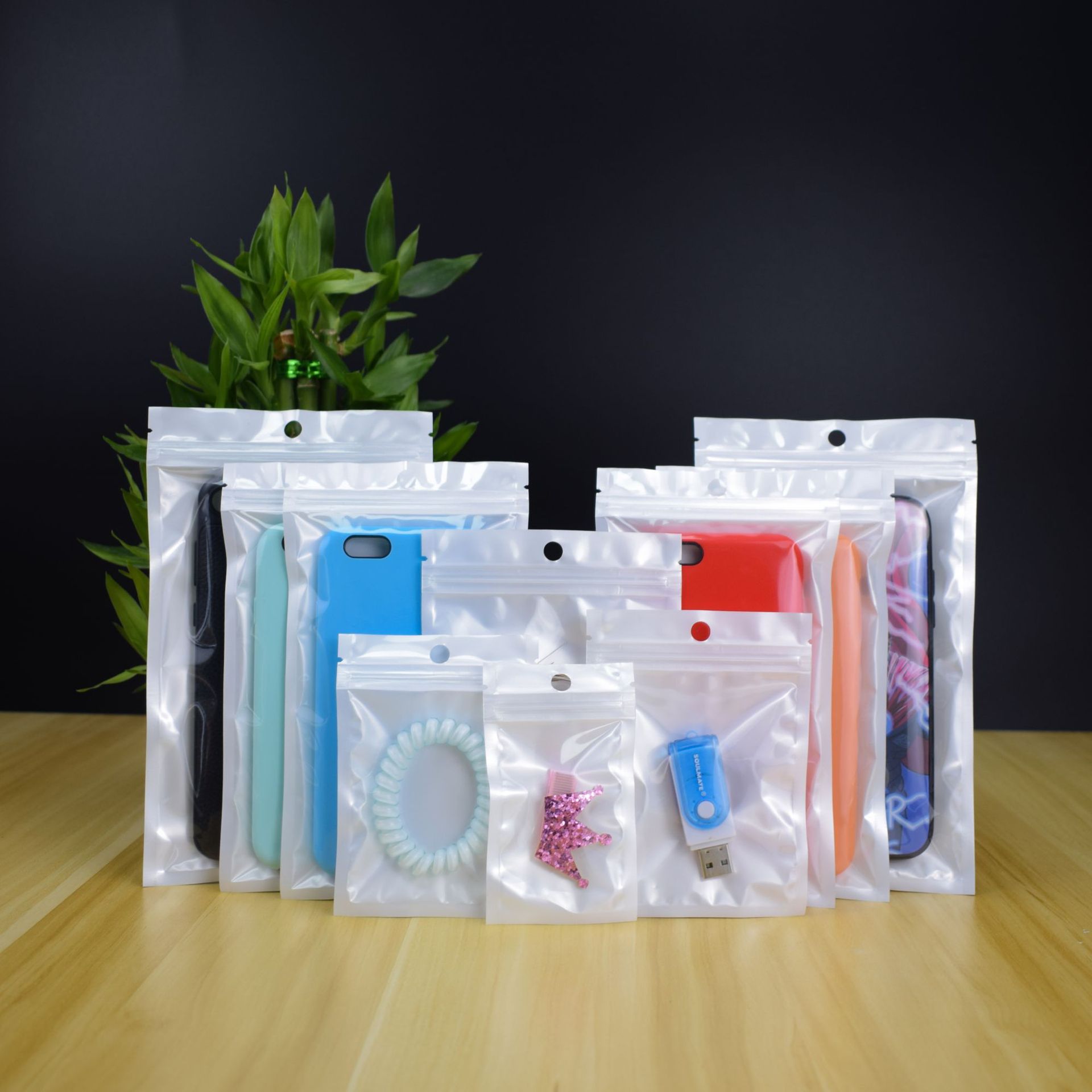 En stock bolsa de perlas autosellable Yin y Yang bolsa de hueso cáscara del teléfono móvil cable de datos bolsa de embalaje accesorios de la joyería bolsa de autosellado