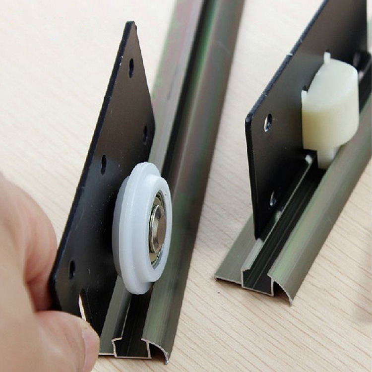 Engrosamiento Cam Placa de hierro rueda de nylon armario puerta corredera polea muebles armario puerta corredera rueda 338 puerta corredera rueda