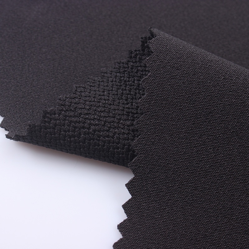 厂家直销斜纹400d涤纶四面弹登山布弹力户外服防水运动弹力布料