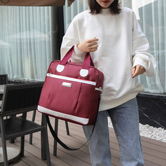 Printed logo waterproof travel bag, hand-held shoulder luggage clothing travel bag with back cover telescopic rod Oxford cloth