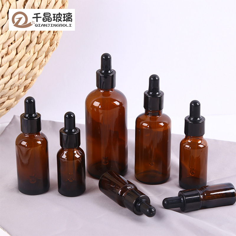 Botella de aceite esencial marrón 10ml 30ml botella cosmética botella de loción de vidrio botella dispensadora de cabeza de plástico botella cuentagotas