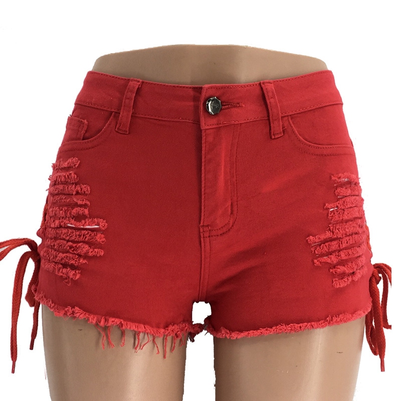 La primavera y el verano de Amazon ripped borla callos pantalones cortos independientes stand cintura baja split vendaje las mujeres en stock