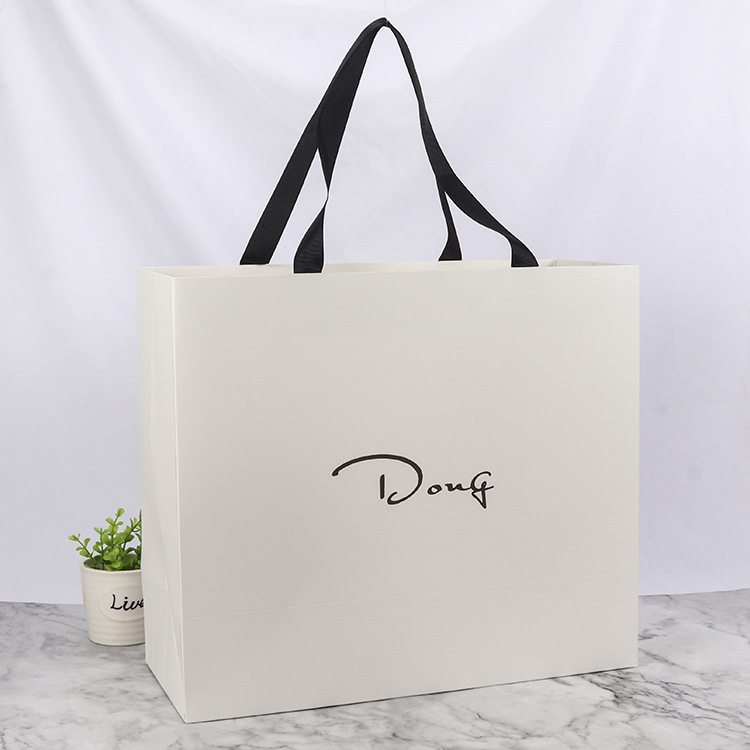 厂家批发白卡纸购物手提袋 纸质包装礼品袋 服装纸袋