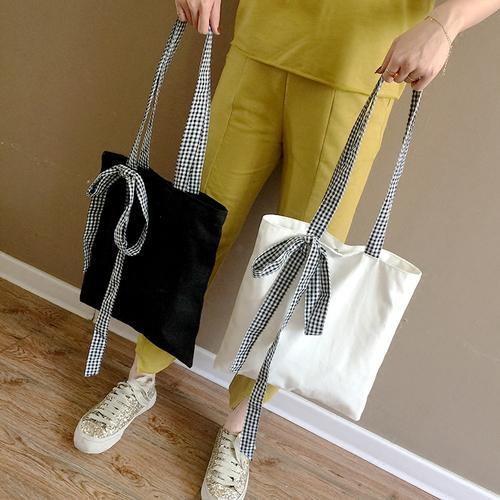 简约清新卡通动漫黑白斜跨包   简约手提帆布袋厂家直供