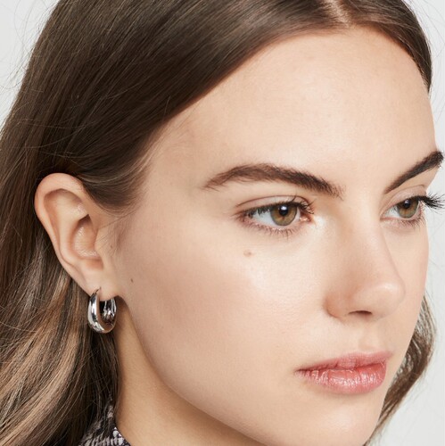 Elegant chunky earrings with a cool European and American metal style, featuring minimalist curved designs, polished brass electroplated with 18K real gold, embodying a trendy and fashionable look.